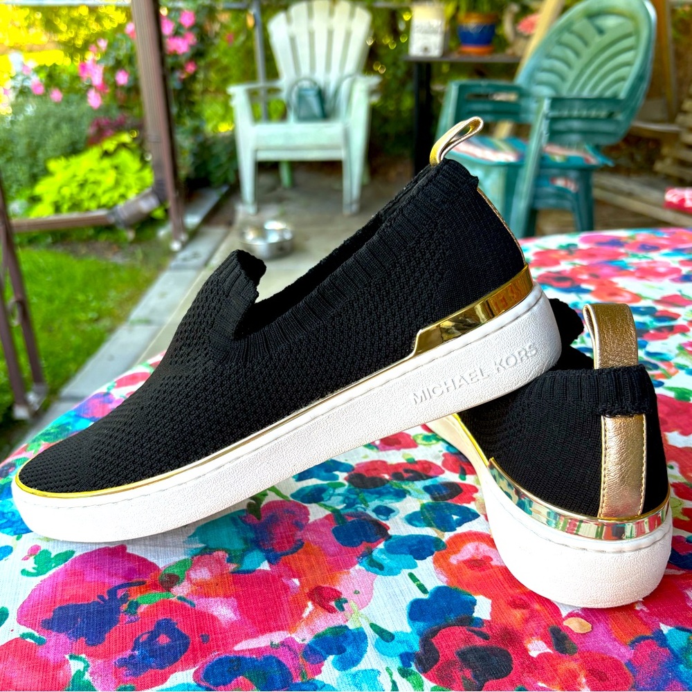 Michael Kors black and gold slip on sneaker , women’s size 8